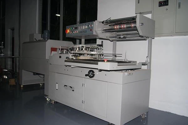 L Type Small Paper Box And Team Bottles Cutting Shrinking Packing Machine